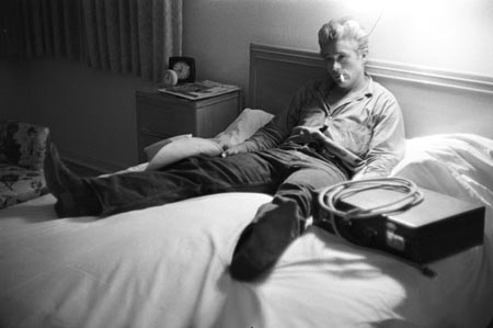 James Dean in his room during the filming of "Giant"