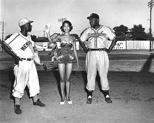 Miss Memphis Red Sox of 1954 with Manager "Goose" Curry  and Lyman Bostoc, Sr of the Birmingham Black Barons