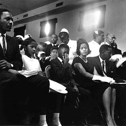 Mrs. Medgar Evers and family at Medgar Evers' funeral, Jackson MS June 12,1963