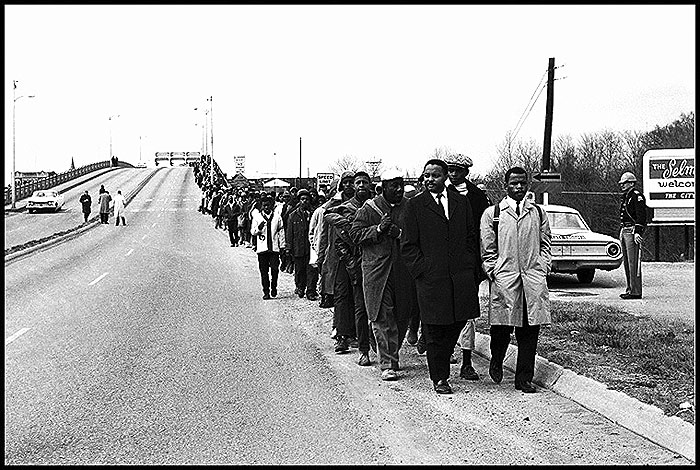 Hosea Williams and John Lewis leading marchers over the Alabama