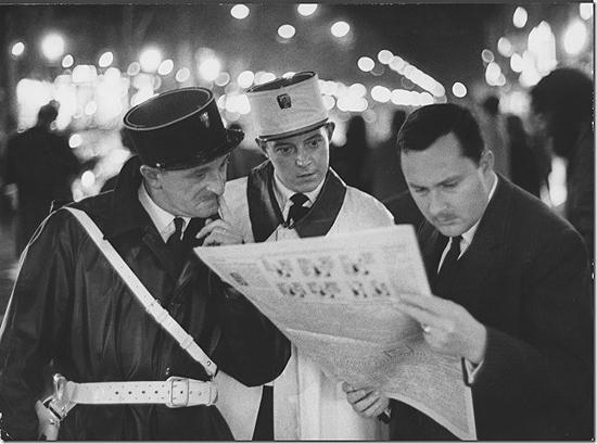 Photo: Ralph Crane - Frenchman reading newspaper reports of assassination of President John F. Kennedy, 1963 Vintage Gelatin Silver Print #1947