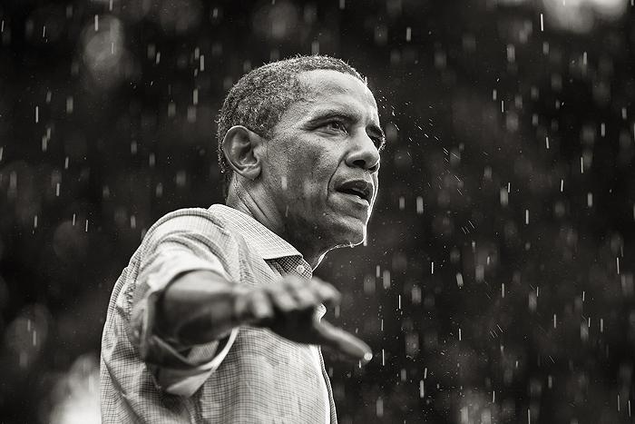 U.S. President Barack Obama speaks in the rain during a campaign rally in Glen Allen, Virginia, 2012<br/>