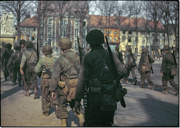Soldier Marching, Ottre, Belgium, 1944