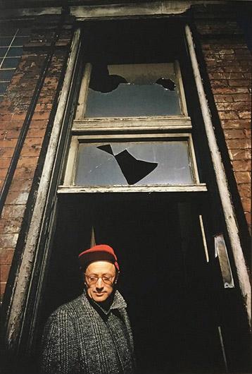 Nelson Algren at his Chicago home site as it is being wrecked for a new expressway, 1957<br/>
