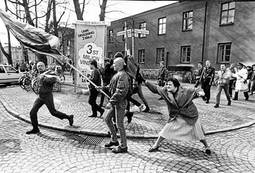 A woman hitting a neo-Nazi with her handbag, Växjö, Sweden, 1985<br/>