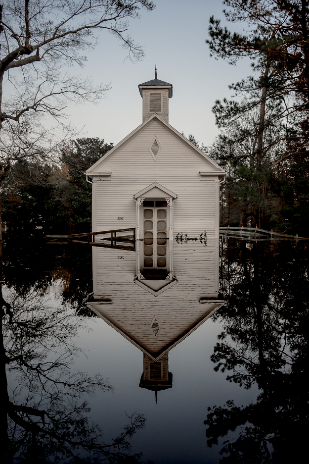 Photo: A church flooded by Hurricane Florence stands silently in its reflection in Burgaw, North Carolina, 2018 Archival Pigment Print #2450