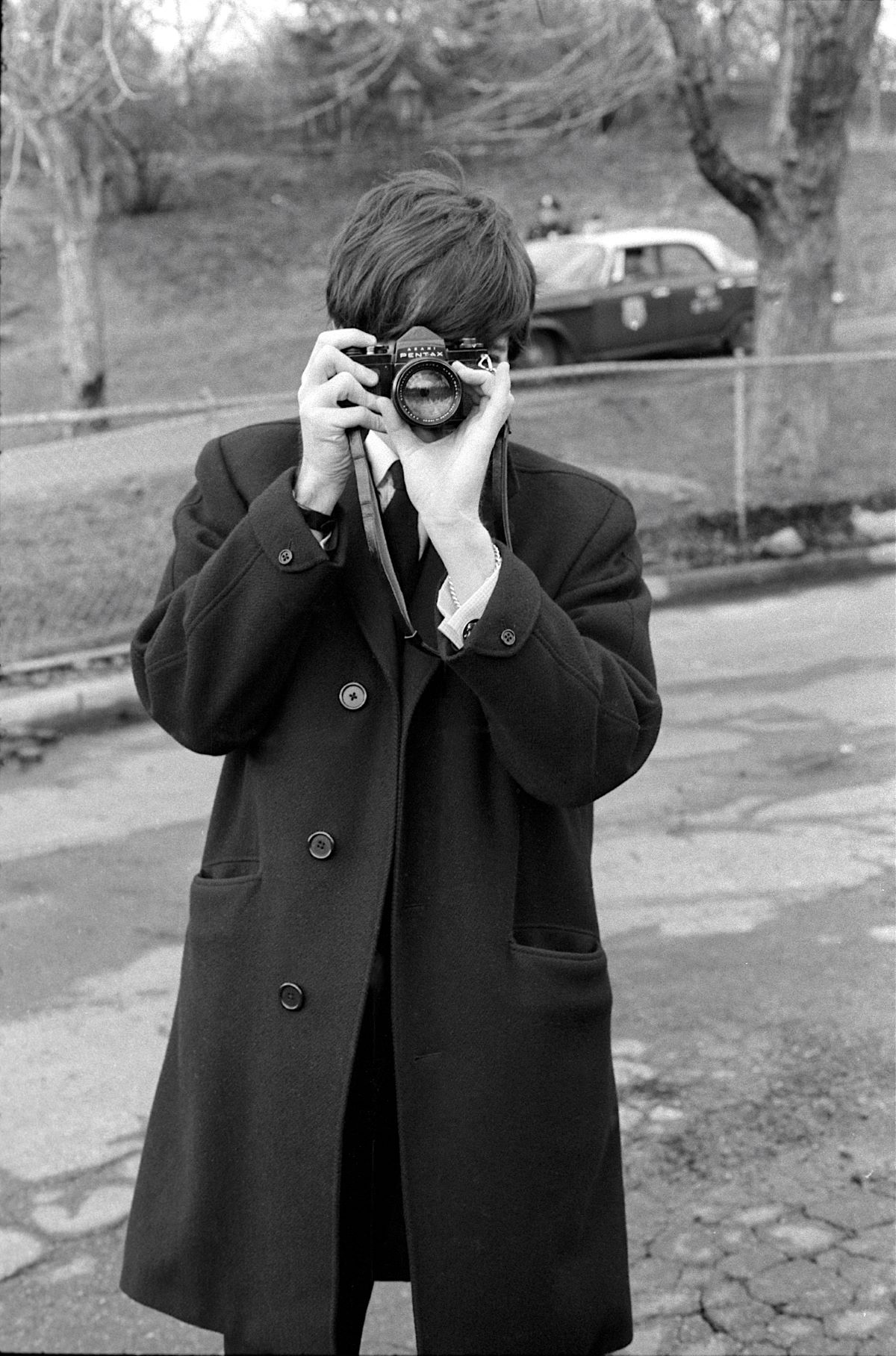 Paul McCartney photographing, New York, 1964