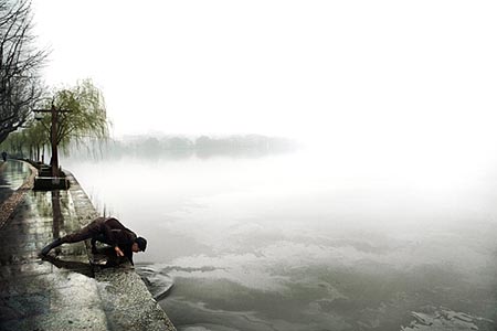 Man and lake, China, 2006