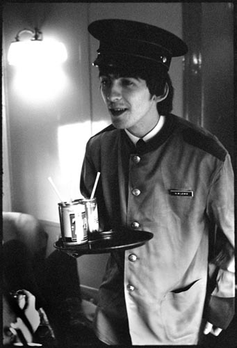 George wearing Train Porter's Jacket. Train to D.C. Feb 10, 1964. Copyright Bill Eppridge