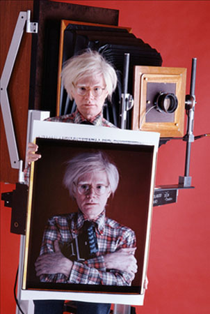 Andy Warhol with Polaroid Camera, NY, 1980