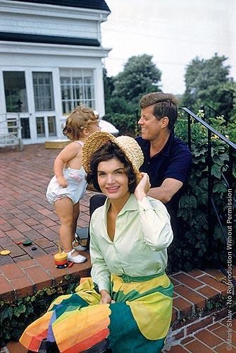 Jackie, Caroline, and John F. Kennedy on the patio of Joseph Kennedy's house, Hyannis Port. 1959<br/>