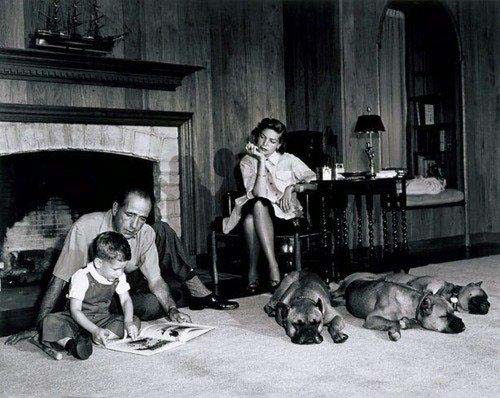 Humphrey Bogart, Lauren Bacall and their son, in their home, Los Angeles, 1952