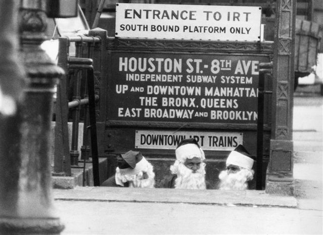 Three Santa Clauses leaving Downtown IRT Subway, New York, 1958