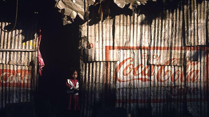 Girl in Doorway, Mumbai, 1999 Archival Pigment Print