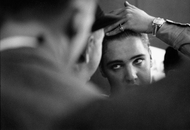 Elvis combing his hair, 1958