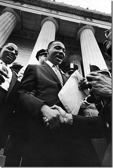 Paul Schutzer - Martin Luther King smiles and shakes hands after address at the Lincoln  Memorial. "Prayer Pilgrimage for Freedom", Washington, DC 1957