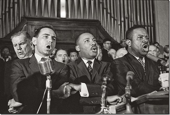 Photo: Martin Luther King Sings "We Shall Overcome" in Selma's Brown Chapel AME Church in March, 1965 Gelatin Silver print #2122