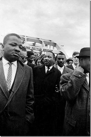 Dr. King crosses the Edmund Pettus Bridge with reverends Ralph Abernathy and Fred Shuttlesworth, 1965