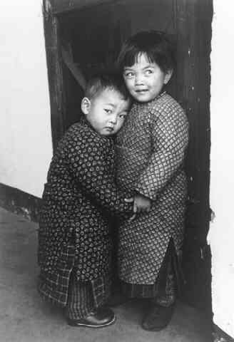 A Child Protects Her Brother from a Stranger with a Camera, Tsingtao, China (Time Inc.)