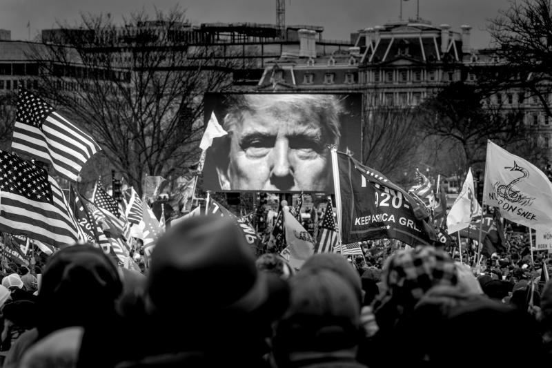 President Trump's image appears onscreen at a rally outside the White House. Before long, a mob of his supporters would march into the Capitol building, January 6, 2021<br/>Please contact Gallery for price