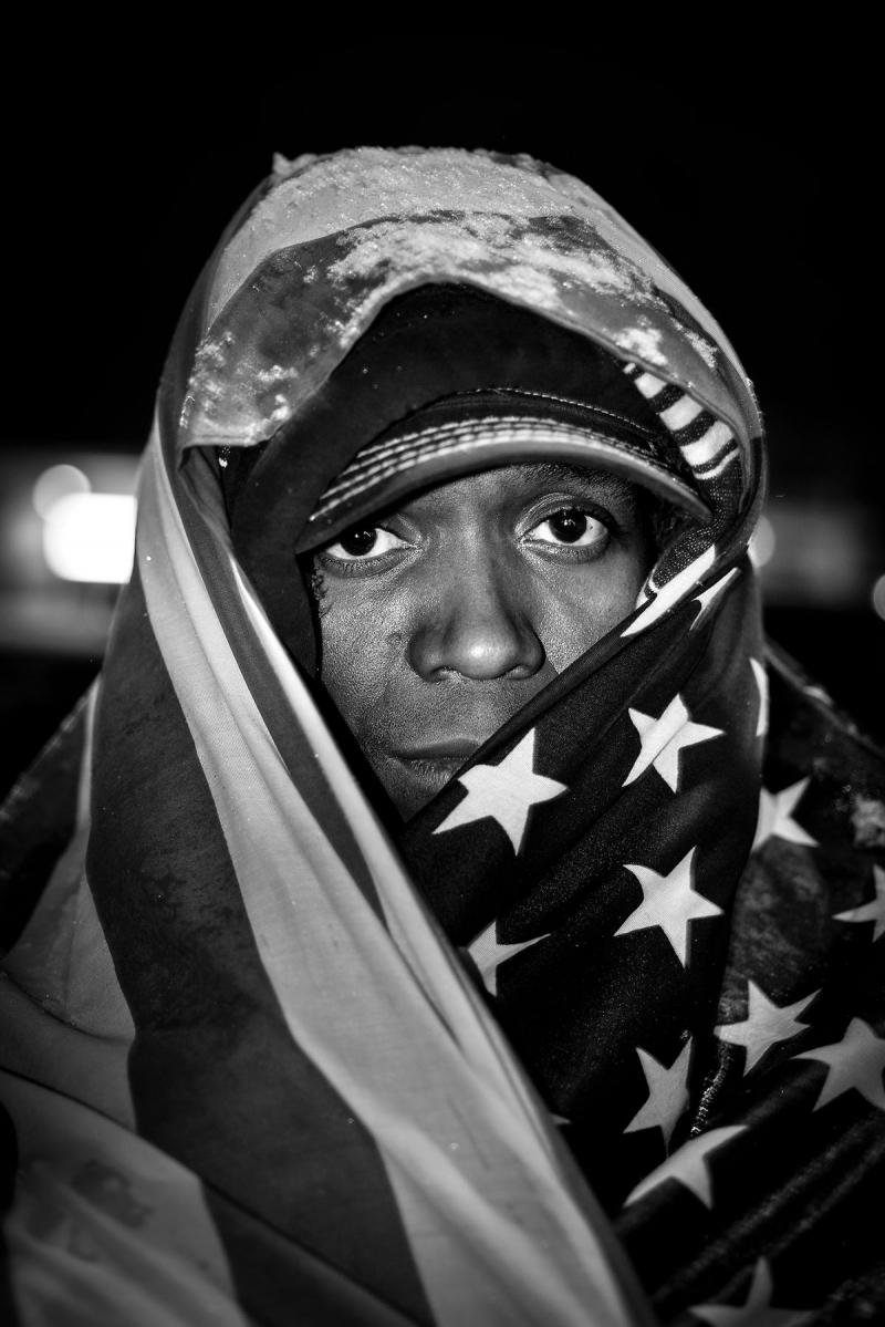 A protester at Ferguson police headquarters two nights after the Grand Jury decision, November 24, 2014<br/>Please contact Gallery for price