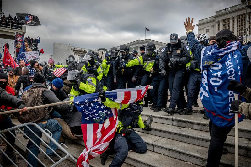 January 6, 2021, Washington, DC. Supporters of President Trump battle law enforcement on the West steps of The Capitol during the attack on the day of Joe Biden’s election certification by Congress.<br/>Please contact Gallery for price