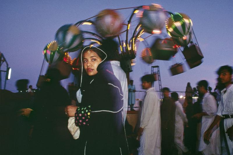 Sightseers visit the colorful Clifton Beach Amusement Park on Karachi, Pakistan, 1998 Archival Pigment Print