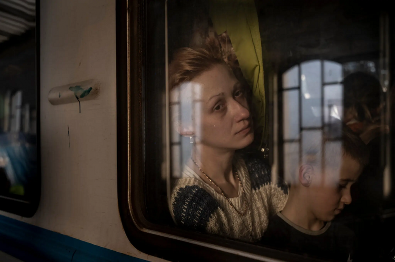 March 15, 2022. Two of the millions of refugees fleeing the war in Ukraine, this woman and her son leave for Poland and a completely unpredictable future.<br/>Please contact Gallery for price