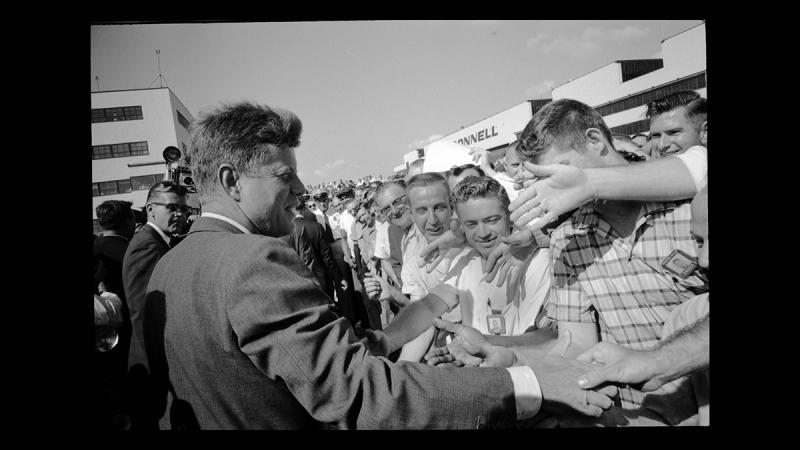 President Kennedy receiving a warm welcome from the McDonnell Aircraft Factory workers along the rope line prior to his speech. Archival Pigment Print