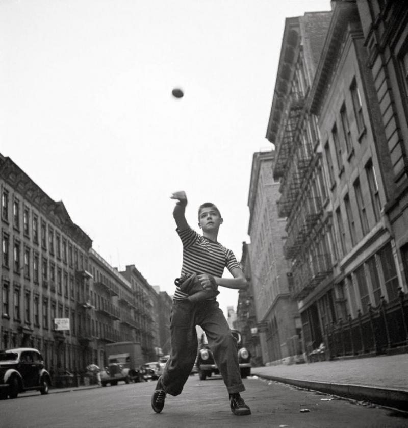 Photo: "The Player": Young boy tossing a ball on a city street, New York, 1948 Gelatin Silver print #2769