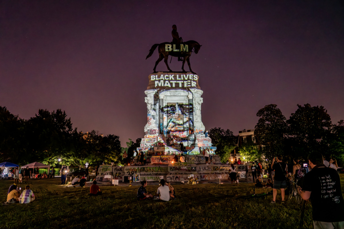 Portrait of George Floyd projected on General Robert E. Lee statue in Richmond VA June 8 2020 by lighting designer Dustin Klein 