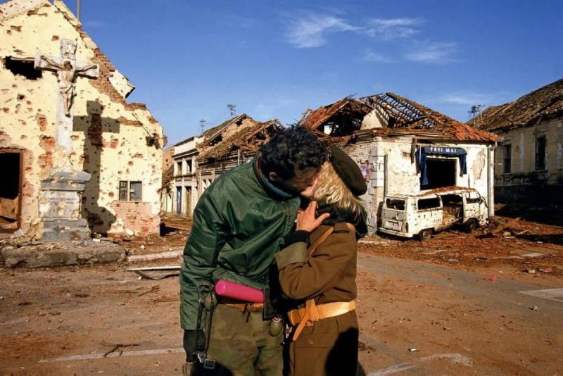 Photo: Serbian paramilitary soldiers celebrate the fall of Vukovar. Croatia 1991 Archival Pigment Print #2947