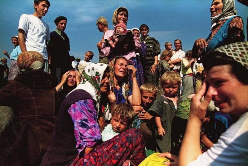 Photo: Survivors of the Serbian attack on Srebrenica learn of the fall of the United Nations safe haven. More than 8,000 Bosnian men were killed and the event was declared genocide. Tuzla, Bosnia  1995 Archival Pigment Print #2950