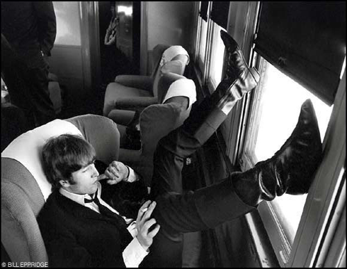 John Lennon on the train from New York to Washington for the Beatles' concert at Washington Coliseum, Feb. 11, 1964
