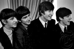 Ringo Starr, George Harrison, John Lennon and Paul McCartney greet the press at the Plaza Hotel in New York, February 1964 Gelatin Silver print