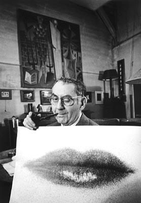 Man Ray Holding Up "Lips" Print<br/>