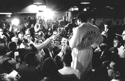 Ali speaks to the media before a fight Gelatin Silver print