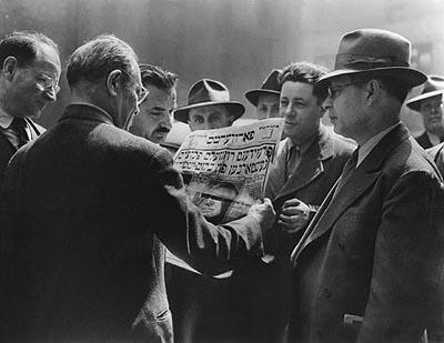 Men of the Garment District Read of President Roosevelt's Death, NYC, 1945 Gelatin Silver print