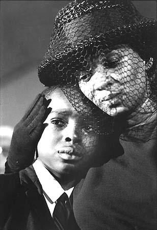 Mrs. Chaney and young Ben, James Chaney funeral, Meridian, Mississippi, 1964<br/>