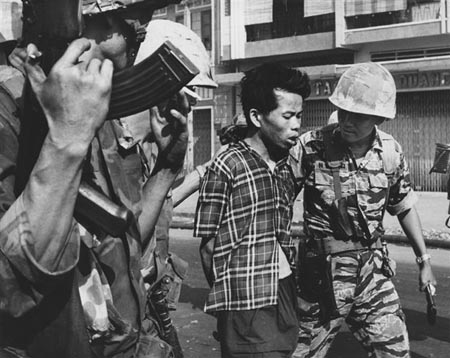 Prisoner being escorted, Saigon,1968