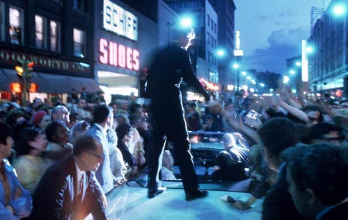 Bobby Kennedy campaigns  into the night, 1968