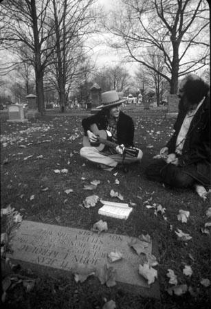 Bob Dylan and Allen Ginsberg at Jack Kerouac's grave, Lowell, MA, 1975<br/>