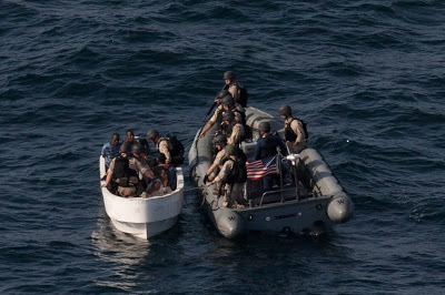 Image #1 for Tyler Hicks Photos of rescue of Iranian fishermen by US Navy in Gulf of Oman