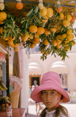 color photograph of Tony Vaccaro's wife, Anja, in front of Orange tree