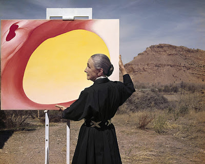 Tony Caccaro Photograph of Georgia O'Keeffe holding Pelvis Red-Yellow painting