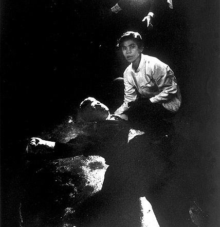 Busboy Juan Romero tries to comfort Presidential candidate Bobby Kennedy after assassination attempt, June 5, 1968
