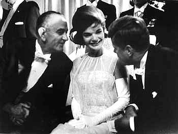 President John F.Kennedy with his wife, Jacqueline, and Vice-President Lyndon B. Johnson at inaugural celebration, Mayflower Hotel, Washington, DC, 1961